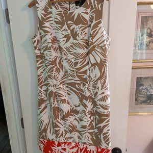 Beige and white dress.